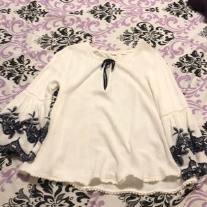 Long sleeve white top with bell sleeves